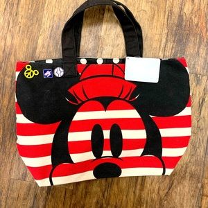 Disney tote with three Disney pins